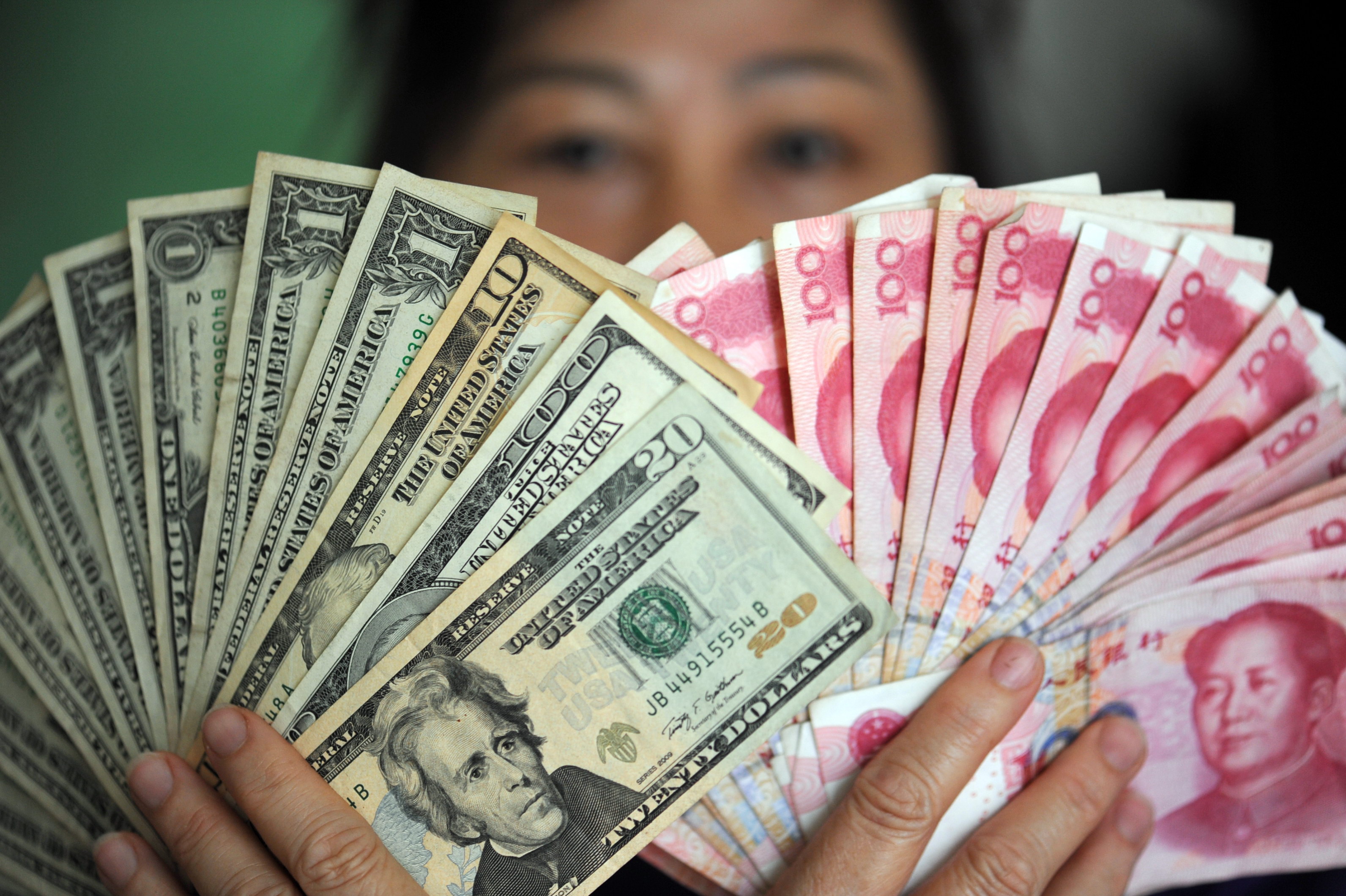 Multimedia) Chinese yuan weakens to 6.8990 against USD Tuesday - Xinhua |  English.news.cn