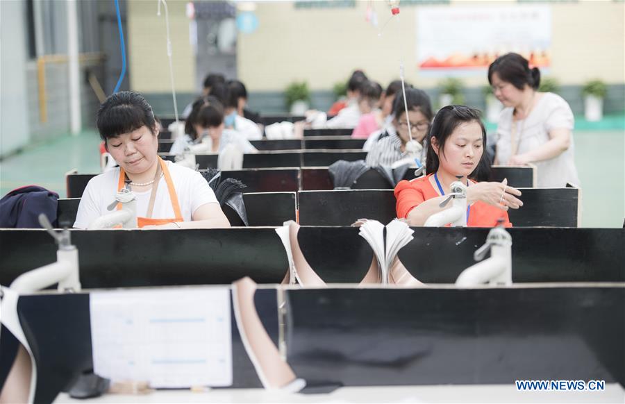CHINA-HUBEI-POVERTY ALLEVIATION-SHOES MAKING WORKSHOP (CN)