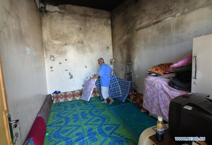 SYRIA-HOMS-DISPLACED SYRIAN FAMILY-HOME