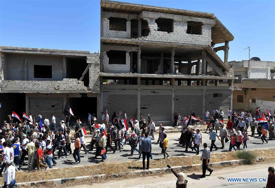 SYRIA-HOMS-CIVILIANS-RETURNING HOME