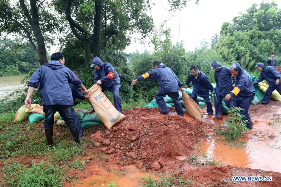 Image result for Flood rescue and relief work carried out in China's Jiangxi