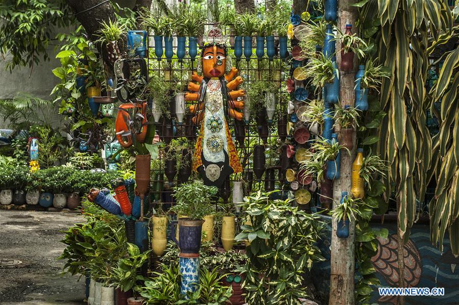 INDIA-KOLKATA-GARDEN-REUSED WASTE