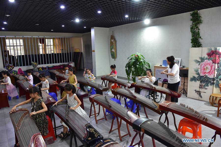 CHINA-SHANXI-HEJIN-DISABLED GIRL-GUZHENG (CN)