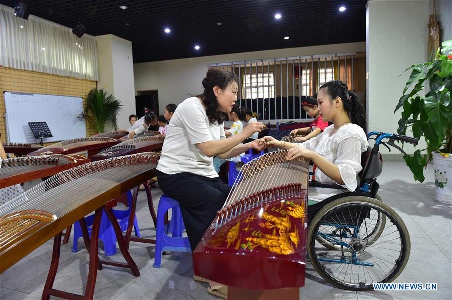 CHINA-SHANXI-HEJIN-DISABLED GIRL-GUZHENG (CN)