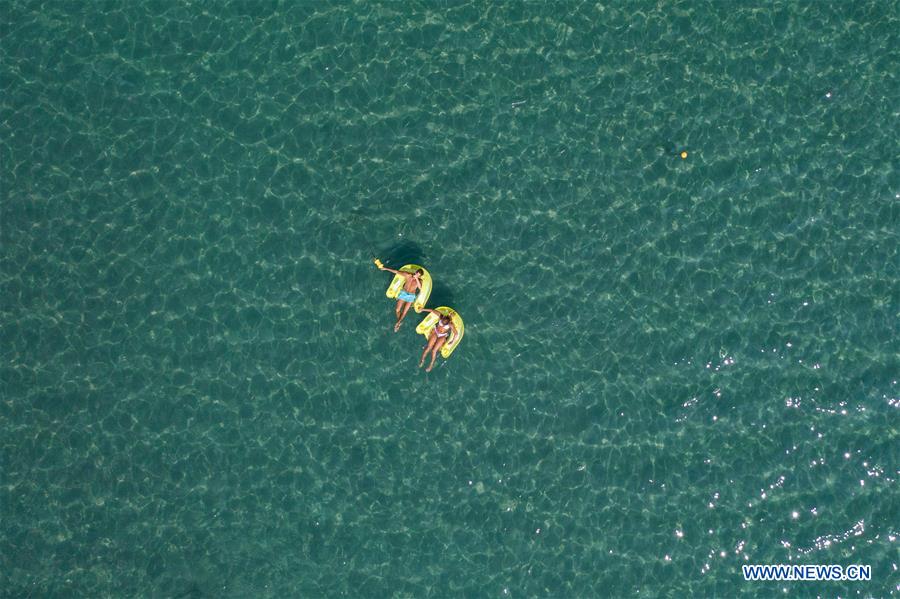 GREECE-ATHENS-HEATWAVE-BEACH