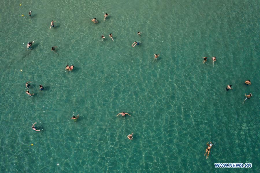 GREECE-ATHENS-HEATWAVE-BEACH
