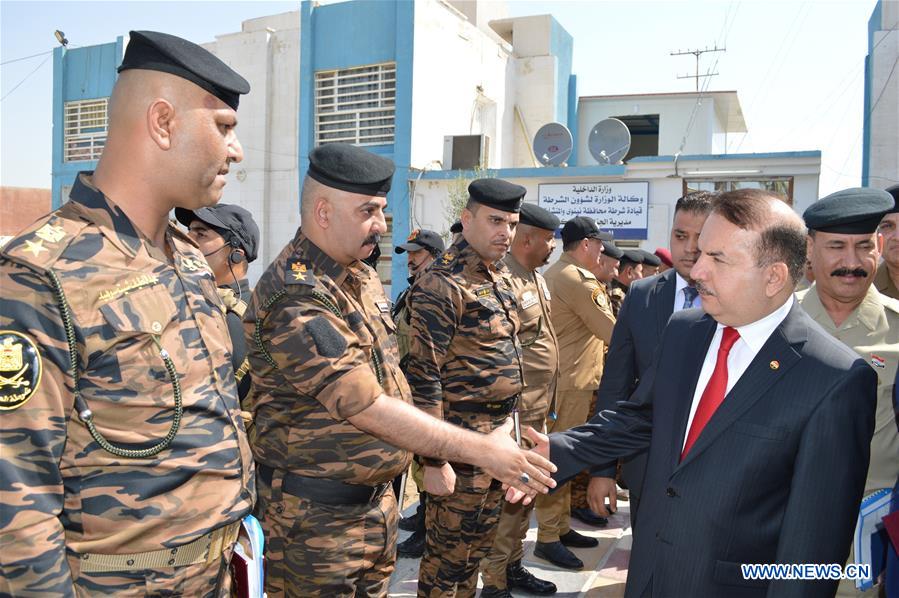IRAQ-BAGHDAD-POLICE PERSONNEL REINSTATING