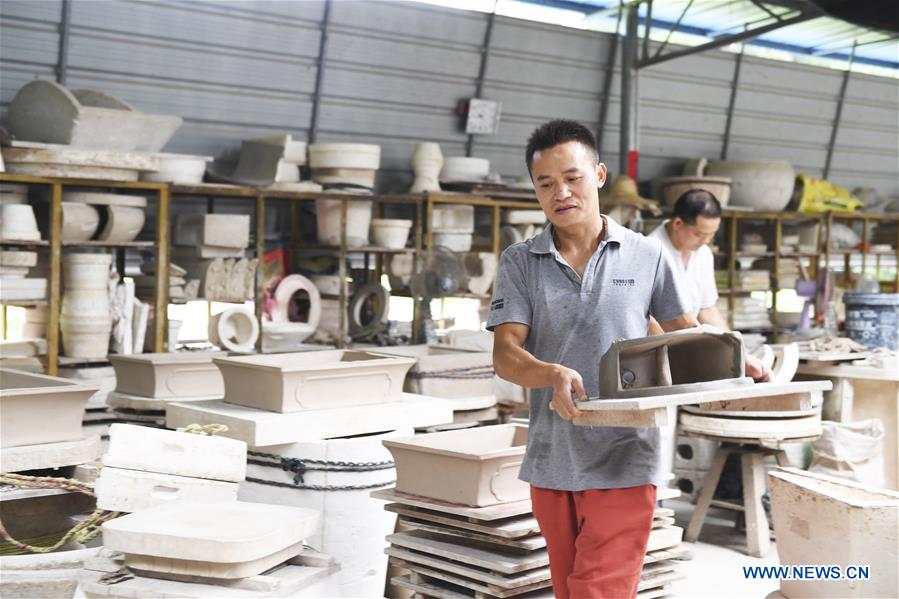 CHINA-GUANGXI-GUIPING-MIGRANT WORKER-BUSINESS STARTUP (CN)