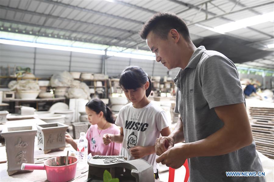 CHINA-GUANGXI-GUIPING-MIGRANT WORKER-BUSINESS STARTUP (CN)