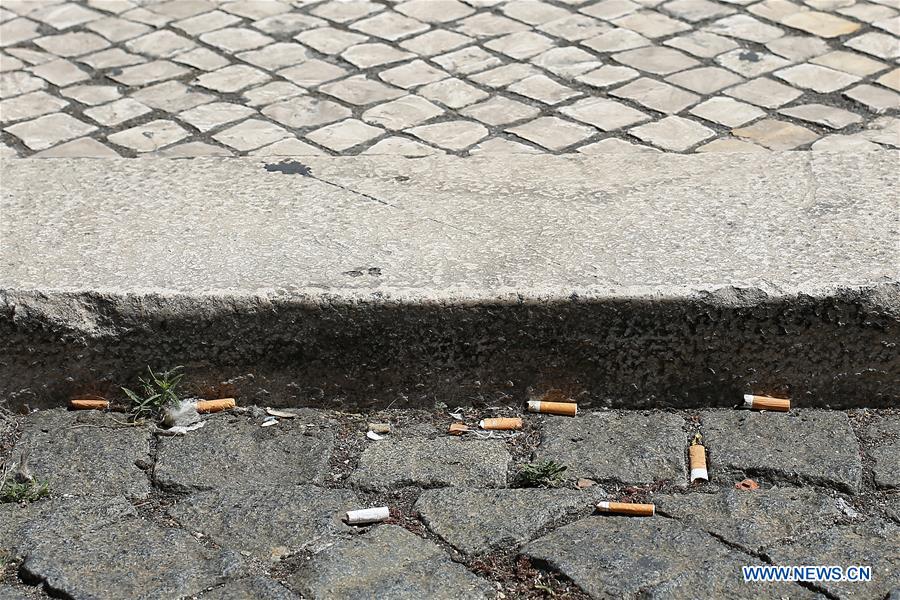 PORTUGAL-LISBON-LAW-CIGARETTE BUTTS THROWER