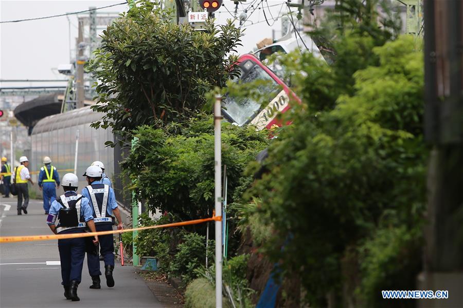 JAPAN-YOKOHAMA-TRAIN-TRUCK-COLLISION
