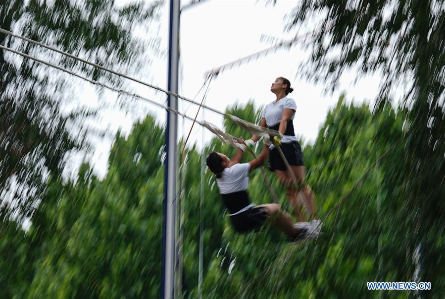 (SP)CHINA-ZHENGZHOU-NATIONAL TRADITIONAL GAMES OF ETHNIC MINORITIES-SWING(CN)