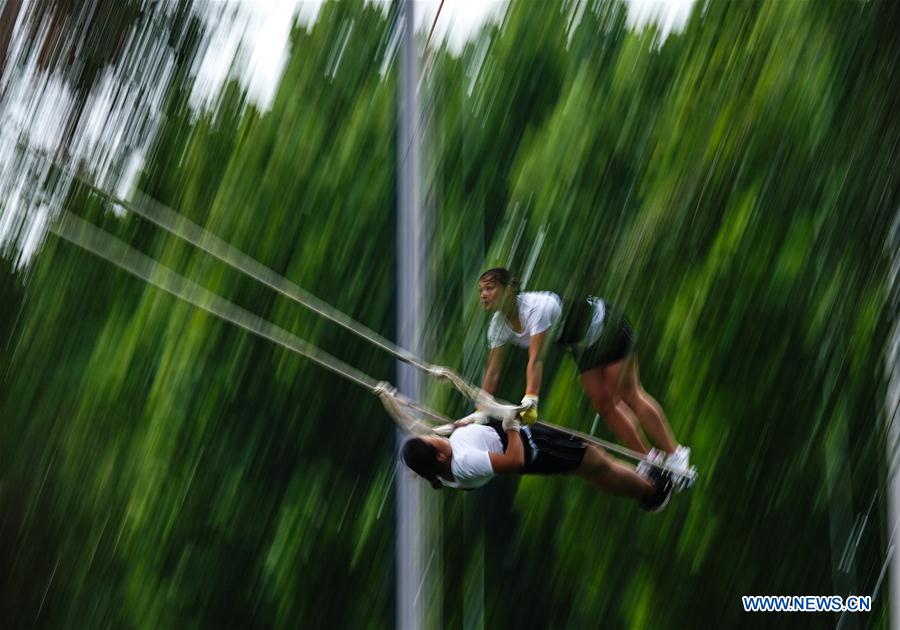 (SP)CHINA-ZHENGZHOU-NATIONAL TRADITIONAL GAMES OF ETHNIC MINORITIES-SWING(CN)