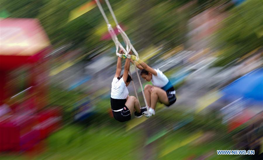 (SP)CHINA-ZHENGZHOU-NATIONAL TRADITIONAL GAMES OF ETHNIC MINORITIES-SWING(CN)