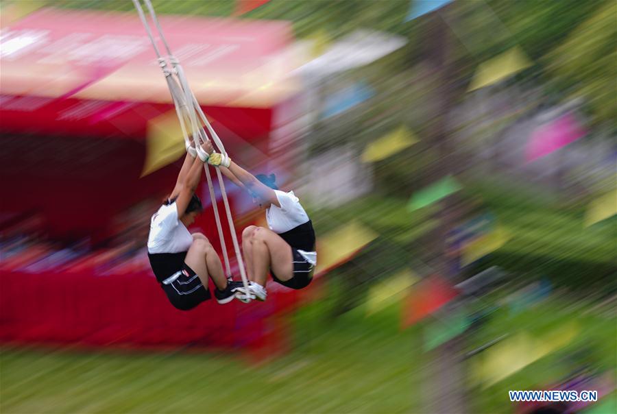 (SP)CHINA-ZHENGZHOU-NATIONAL TRADITIONAL GAMES OF ETHNIC MINORITIES-SWING(CN)