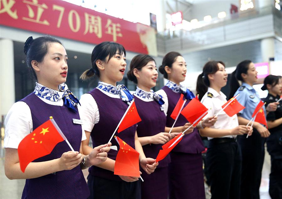 People Take Part in Flash Mob in Shanghai to Celebrate 70th Anniversary of PRC Founding