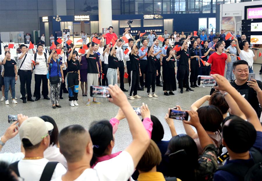 People Take Part in Flash Mob in Shanghai to Celebrate 70th Anniversary of PRC Founding