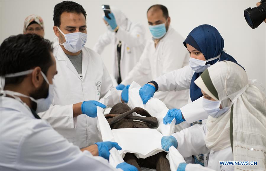 EGYPT-CAIRO-SARCOPHAGI-MUMMIES-UNPACKING