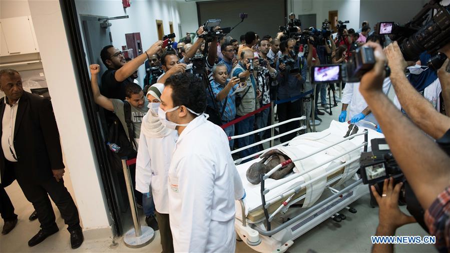 EGYPT-CAIRO-SARCOPHAGI-MUMMIES-UNPACKING