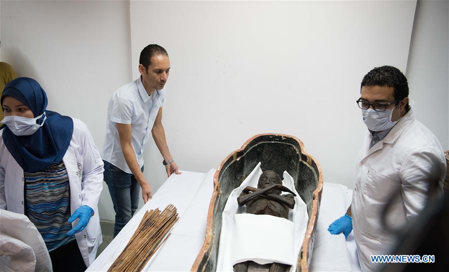 EGYPT-CAIRO-SARCOPHAGI-MUMMIES-UNPACKING