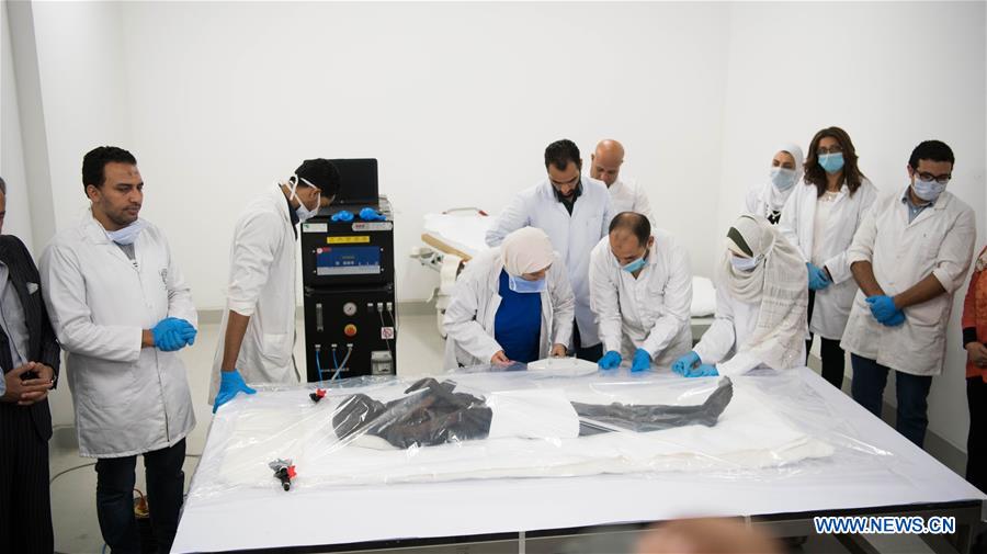 EGYPT-CAIRO-SARCOPHAGI-MUMMIES-UNPACKING