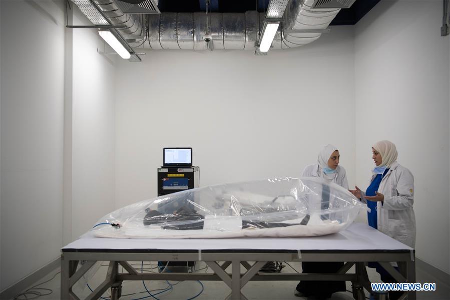 EGYPT-CAIRO-SARCOPHAGI-MUMMIES-UNPACKING