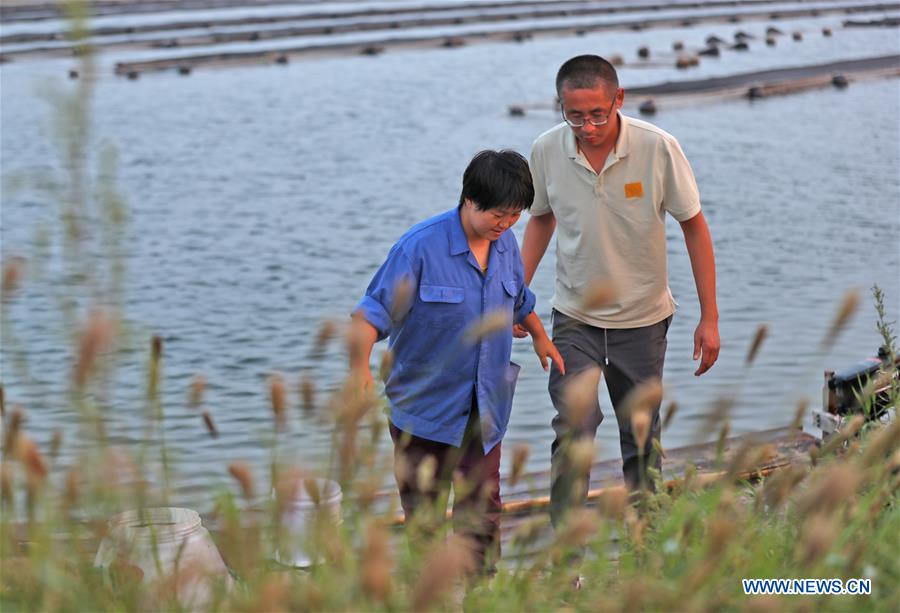 CHINA-LIAONING-GAIZHOU-FISHERWOMAN-TURBOT RAISING (CN)