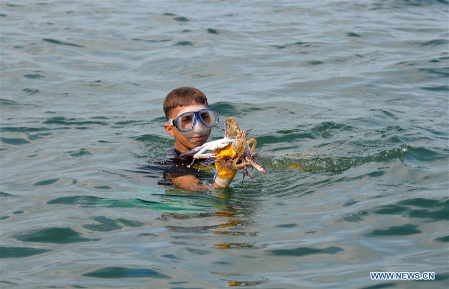 MIDEAST-GAZA-FISHERMAN