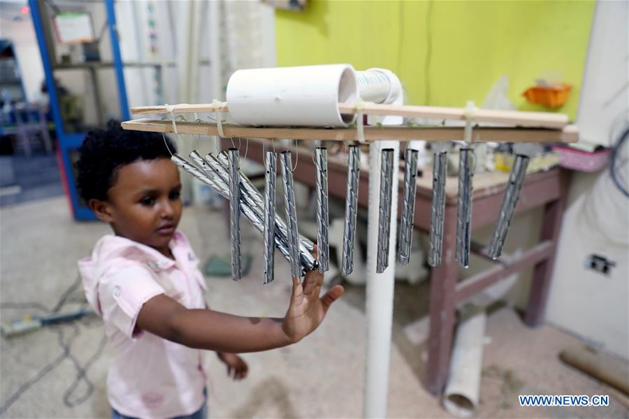 EGYPT- LUXOR-GARBAGE INTO MUSICAL INSTRUMENTS