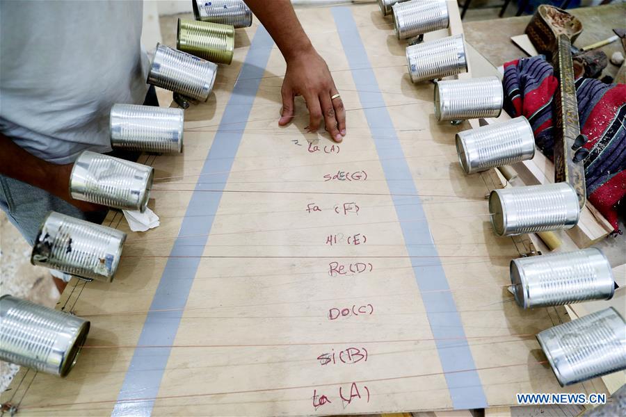 EGYPT- LUXOR-GARBAGE INTO MUSICAL INSTRUMENTS