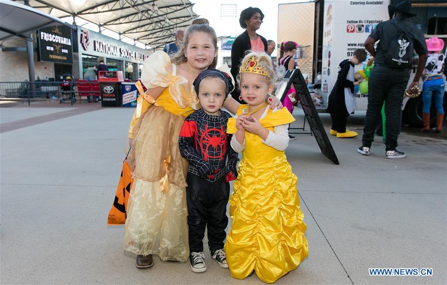 People participate in Halloween costume contest in Frisco, U.S