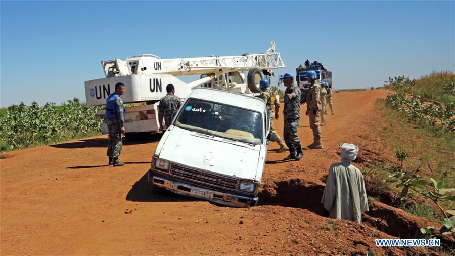 SUDAN-DARFUR-CHINESE PEACEKEEPERS-TRAPPED VEHICLE-RESCUE