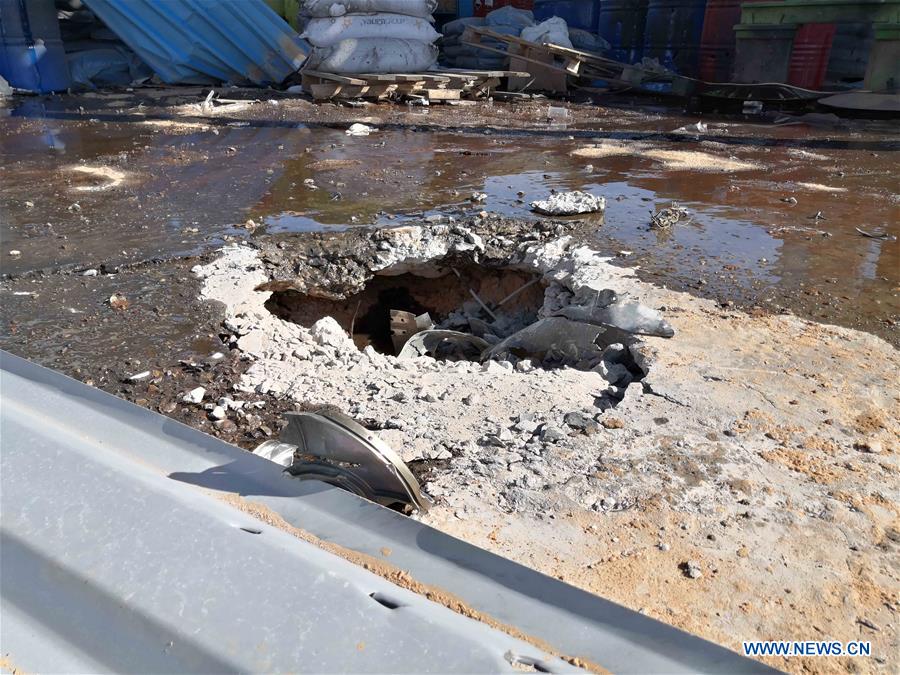 (SPOT NEWS)LIBYA-TRIPOLI-AIRSTRIKE-FACTORY