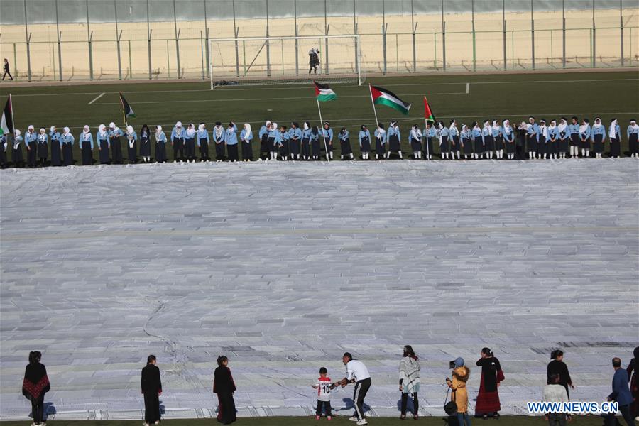 MIDEAST-HEBRON-KEFFIYEH