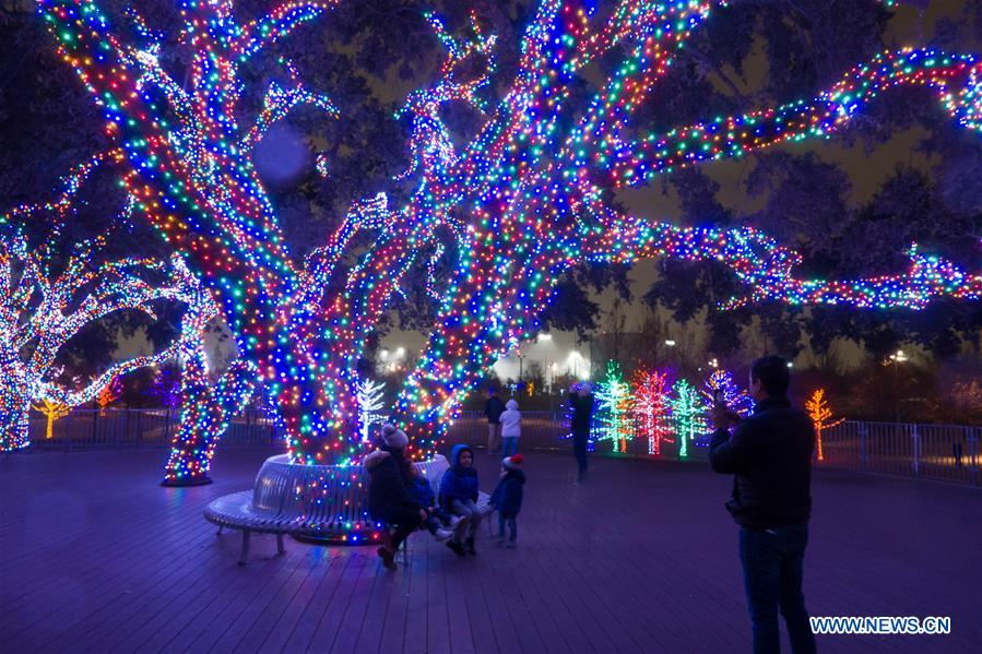 Light decorations set up to Christmas season Xinhua