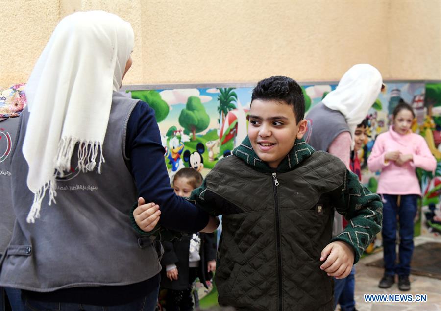 SYRIA-DAMASCUS-CHRISTMAS-CELEBRATION-CHILDREN