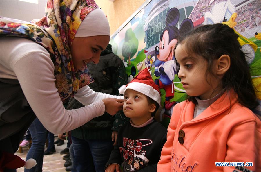 SYRIA-DAMASCUS-CHRISTMAS-CELEBRATION-CHILDREN