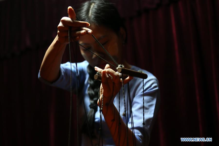 MYANMAR-YANGON-FEMALE PUPPETEER