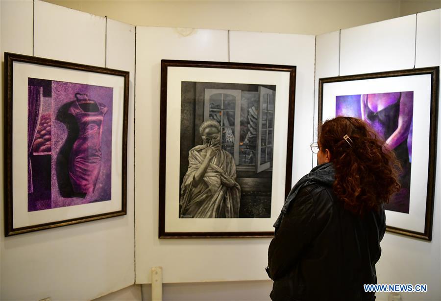 SYRIA-DAMASCUS-ARTIST-PAINTING-WAR