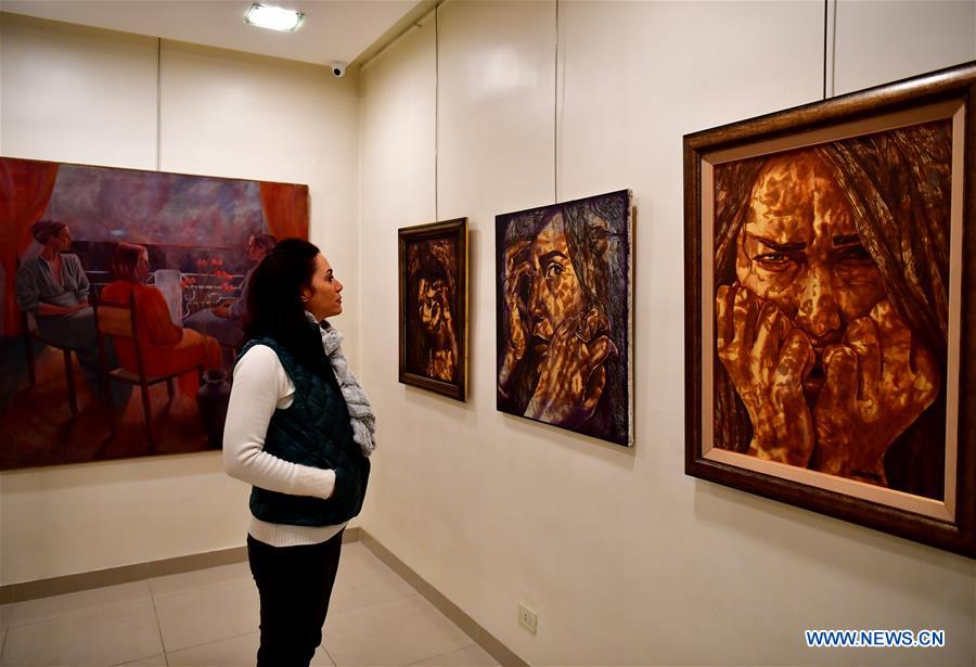 SYRIA-DAMASCUS-ARTIST-PAINTING-WAR