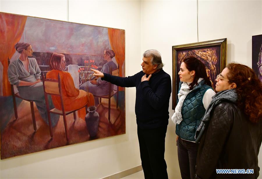 SYRIA-DAMASCUS-ARTIST-PAINTING-WAR