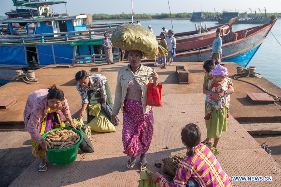 MYANMAR-KYAUKPYU-PIER-FEMALE WORKER