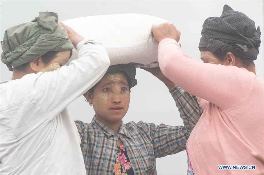 MYANMAR-KYAUKPYU-PIER-FEMALE WORKER
