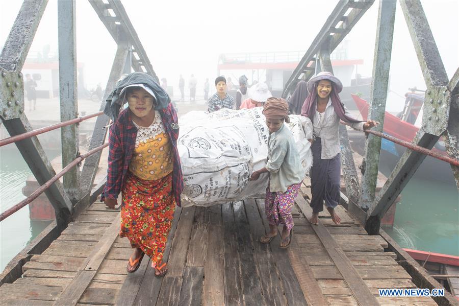 MYANMAR-KYAUKPYU-PIER-FEMALE WORKER