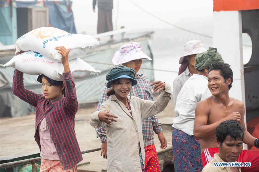 MYANMAR-KYAUKPYU-PIER-FEMALE WORKER