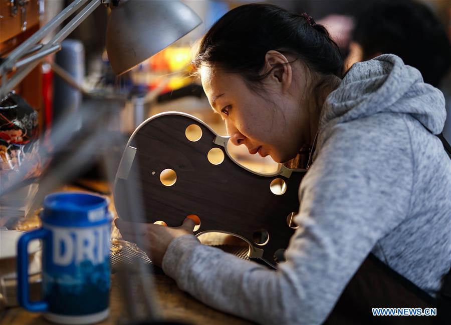Students make violins at Chicago School of Violin Making in Skokie, U.S