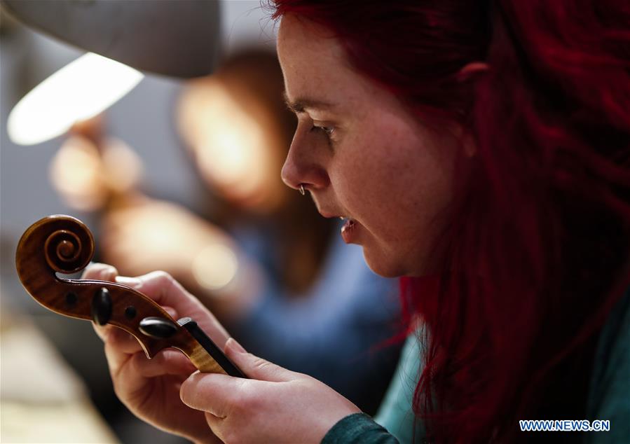 Students make violins at Chicago School of Violin Making in Skokie, U.S. Xinhua English.news.cn