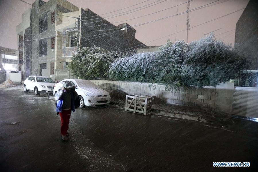 Rare snow pleases people in Iraq's Baghdad Xinhua English.news.cn