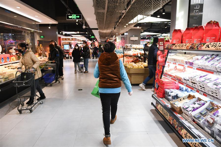 CHINA-BEIJING-NOVEL CORONAVIRUS-STAFF-SHARING (CN)