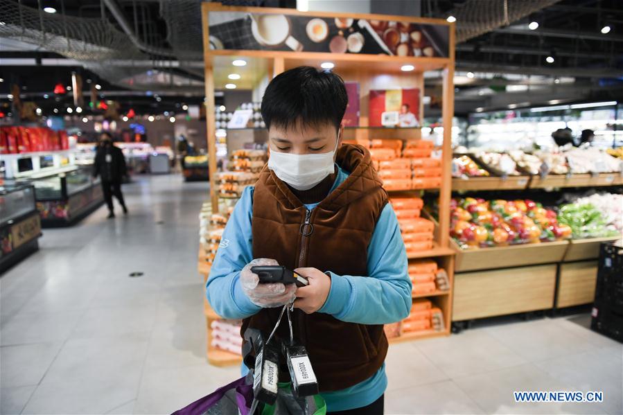 CHINA-BEIJING-NOVEL CORONAVIRUS-STAFF-SHARING (CN)